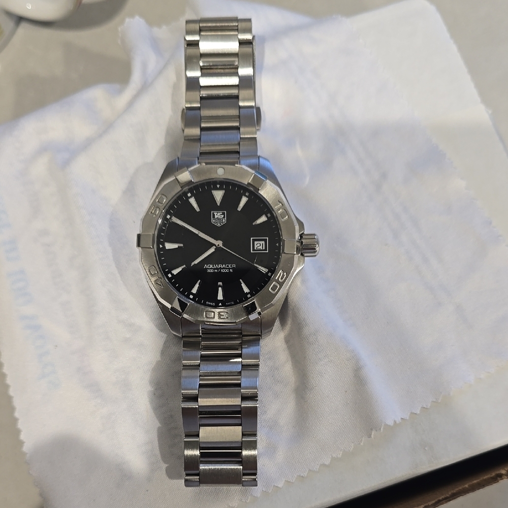 Tag Heuer Silver and Black Watch with Stainless Steel Design